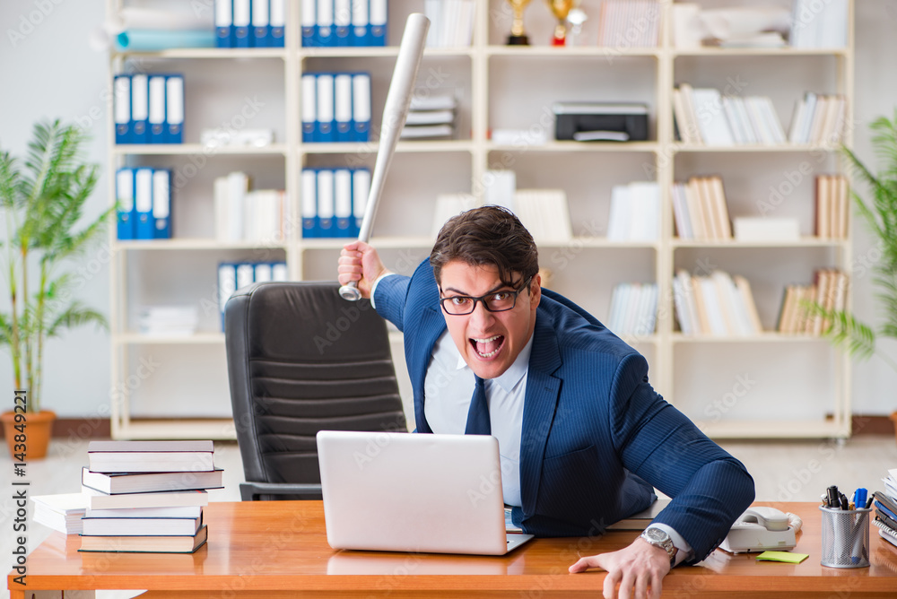Angry aggressive businessman in the office Angry aggressive businessman in the office