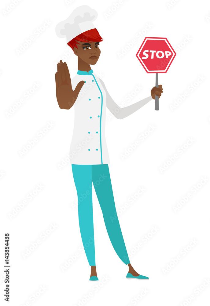 African-american chef cook holding stop road sign. African-american chef cook holding stop road sign.