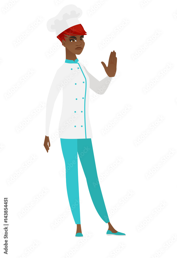 African chef cook showing stop hand gesture. African chef cook showing stop hand gesture.