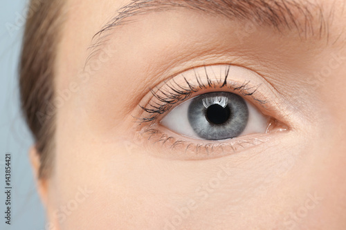 Blue-eyed female face, closeup