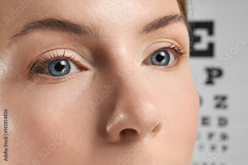 Young woman on eyesight tes...