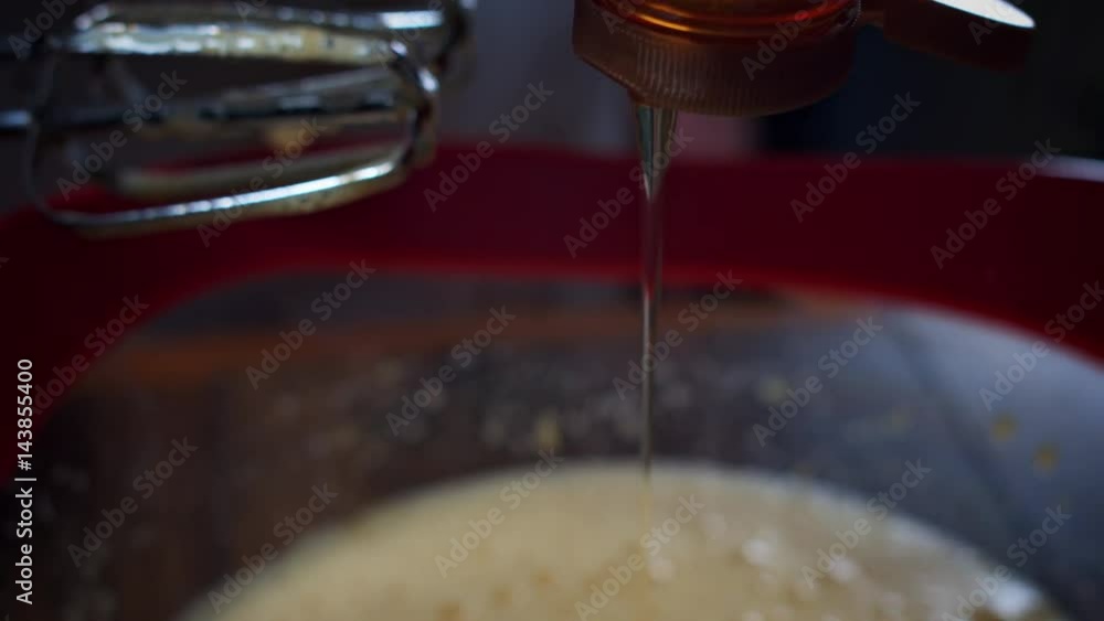 4K Cake Baker Adding Honey Ingredient to Mixture 4K Cake Baker Adding Honey Ingredient to Mixture