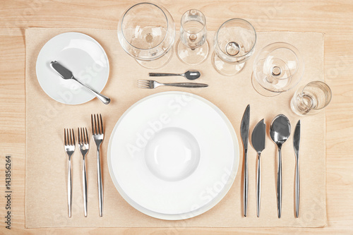 Beautiful table setting with white plates