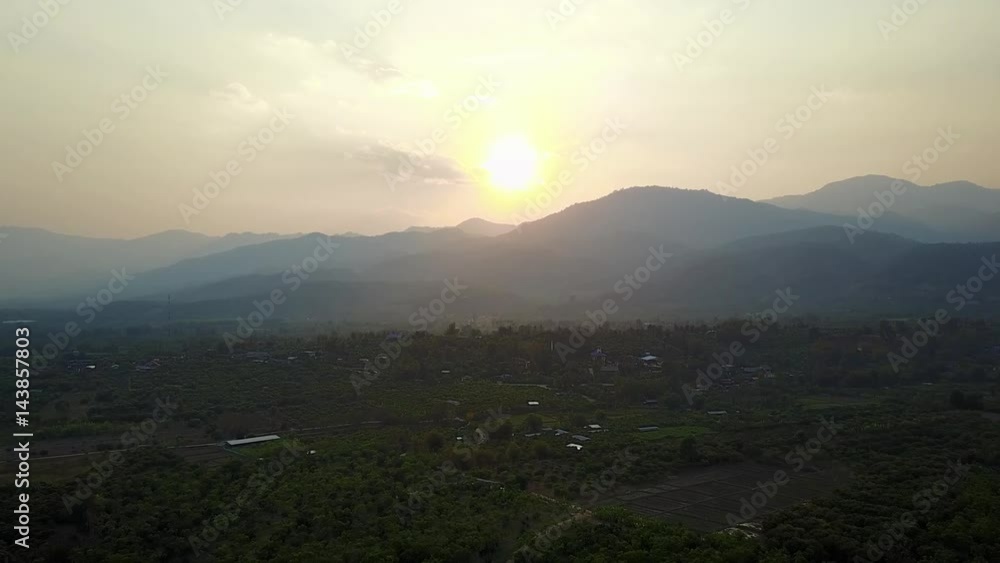 Aerial View. Flying over the beautiful mountain and beautiful forest in during sunset at Doi Ang Khang, Fang City, Chiang Mai, Thailand
Aerial View. Flying over the beautiful mountain and beautiful forest in during sunset at Doi Ang Khang, Fang City, Chiang Mai, Thailand