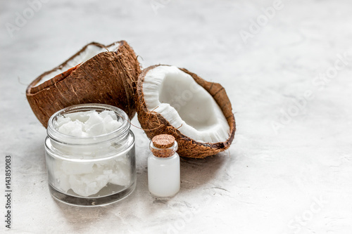 organic cosmetics concept with coconut on table background mock up