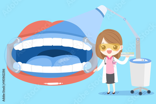 woman dentist with tooth