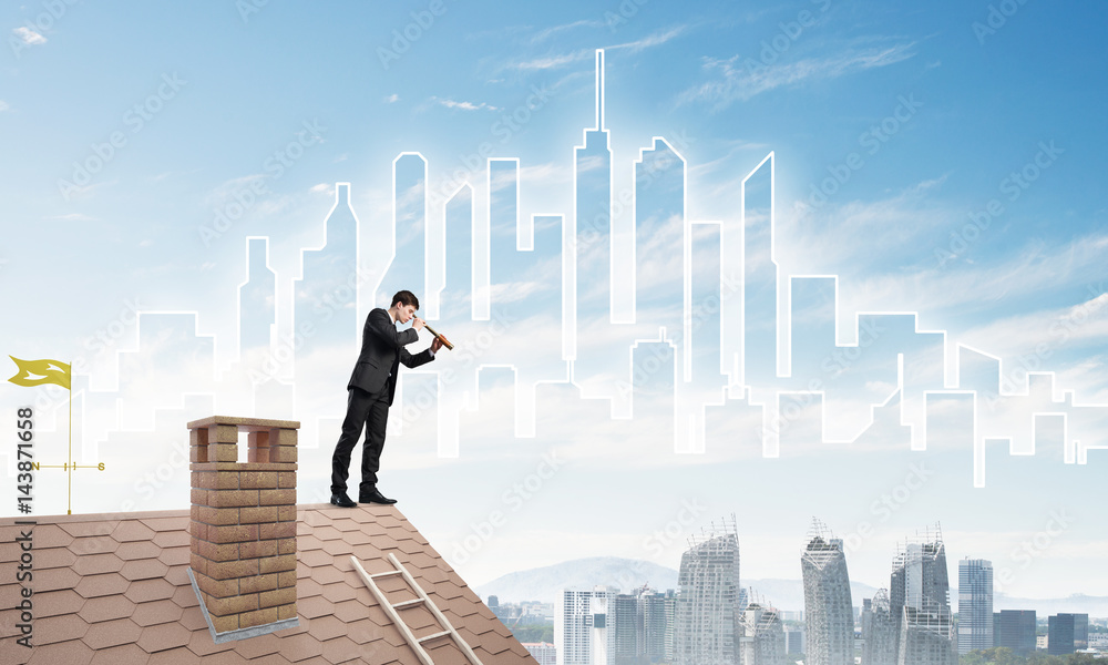 Engineer man standing on roof and looking in spyglass. Mixed media Engineer man standing on roof and looking in spyglass. Mixed media