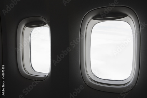 Two airplane windows