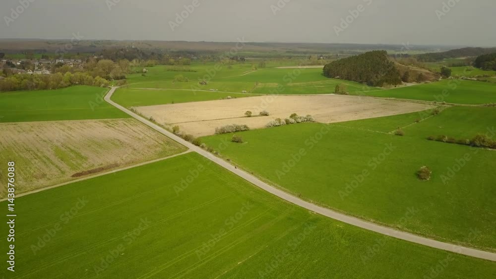 Aerial: flying over the agrarian hilly fields in La Roche Area, Belgian Ardennes Aerial: flying over the agrarian hilly fields in La Roche Area, Belgian Ardennes