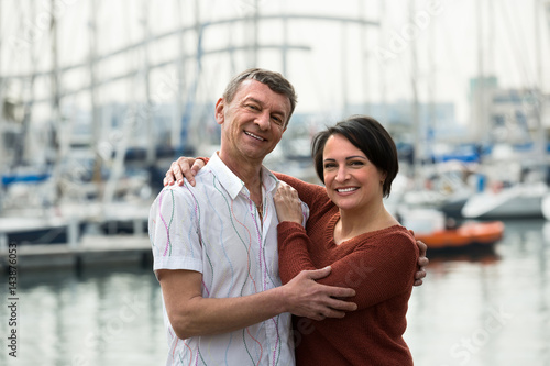 Happy mature couple outdoors.