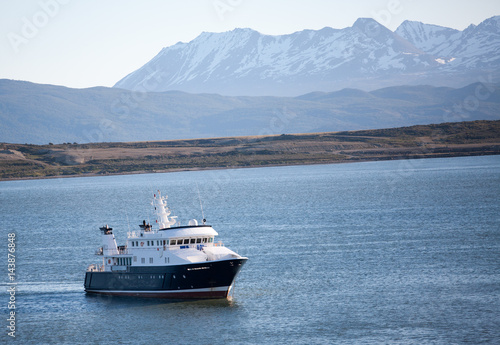 The ship with snowy mountain in background