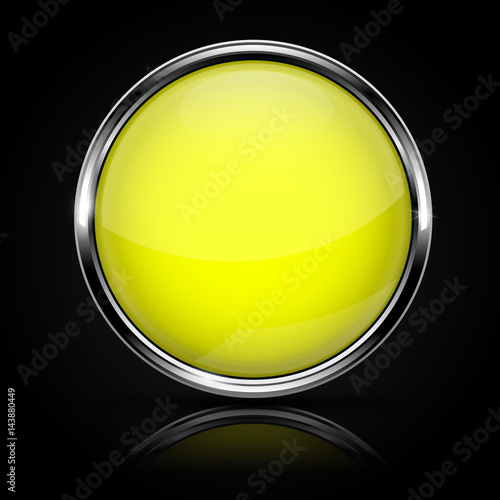 Yellow glass button with chrome frame on black background