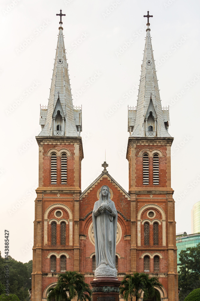 Maria statue in Notre Dame cathedral with white sky background, Ho Chi Minh City, southern Vietnam
