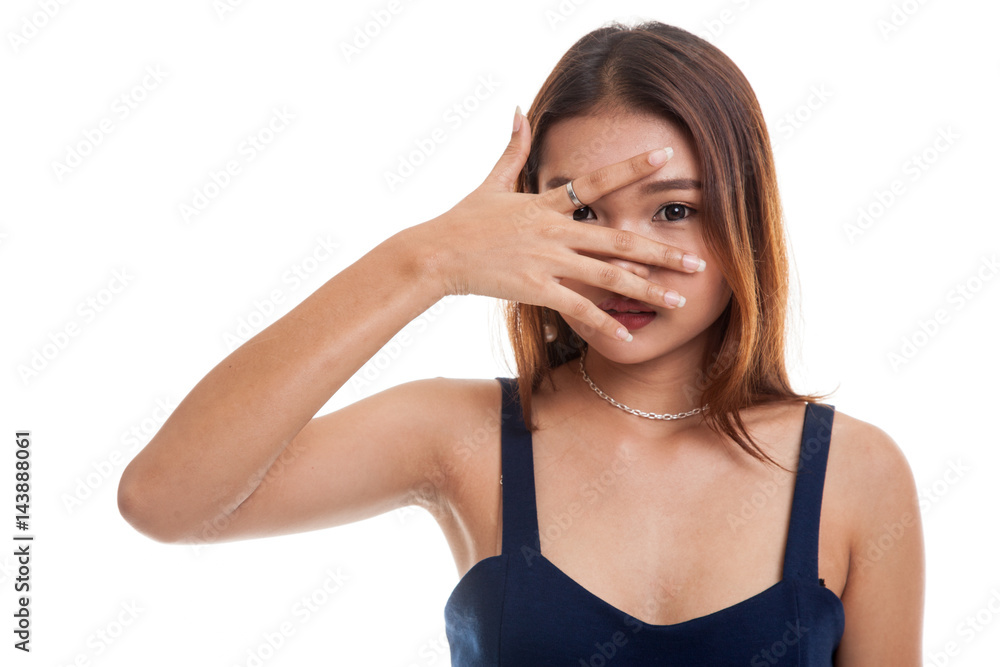 Beautiful young Asian woman peeking through fingers. Beautiful young Asian woman peeking through fingers.