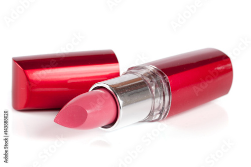 Pink lipstick isolated on white background closeup