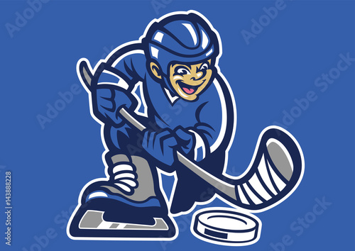 kid playing hockey ice