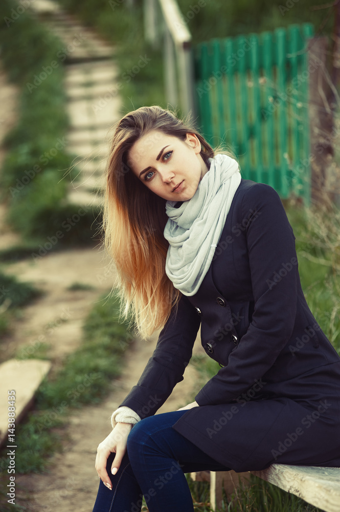 Obraz premium Portrait of beautiful pretty girl. The girl at the spring walk