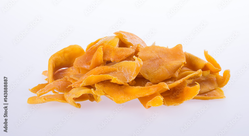 mango dry or dried mango slices on background. mango dry or dried mango slices on background.