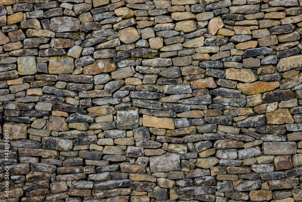 The old and vintage stone wall in a room