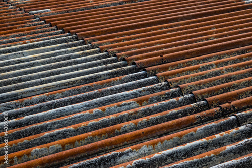 Photography The old and rusty iron roof of a building