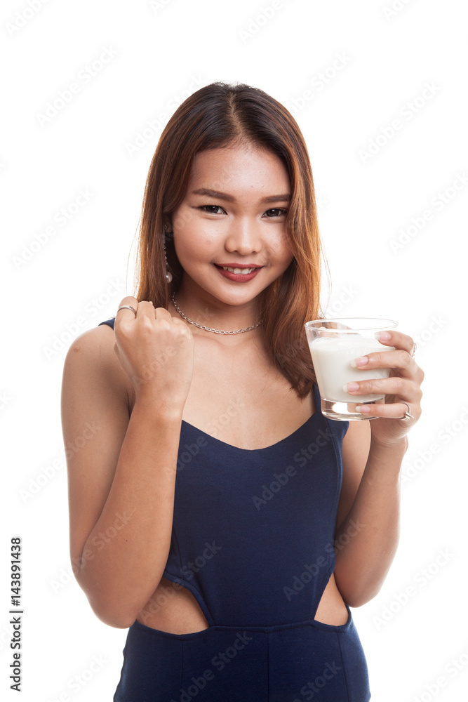 Healthy Asian woman drinking a glass of milk. Healthy Asian woman drinking a glass of milk.