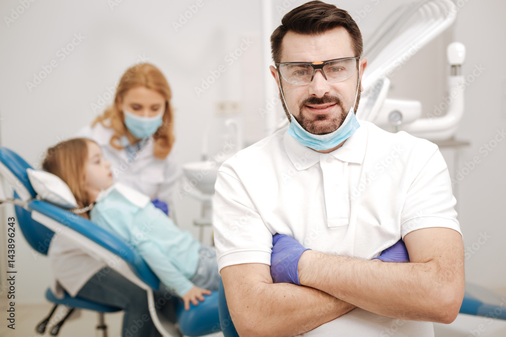 Fototapeta premium Handsome young professional getting ready for work