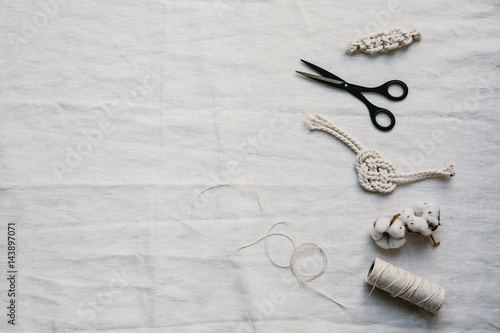 White table top wit yarn and scissors