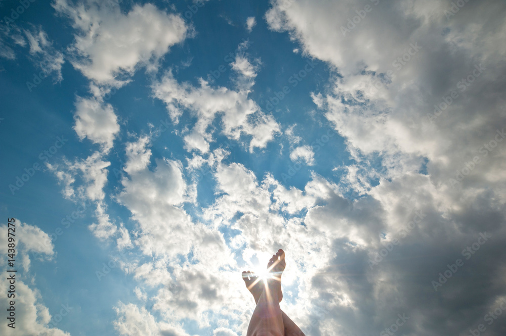 Feet in the sunny sky Feet in the sunny sky