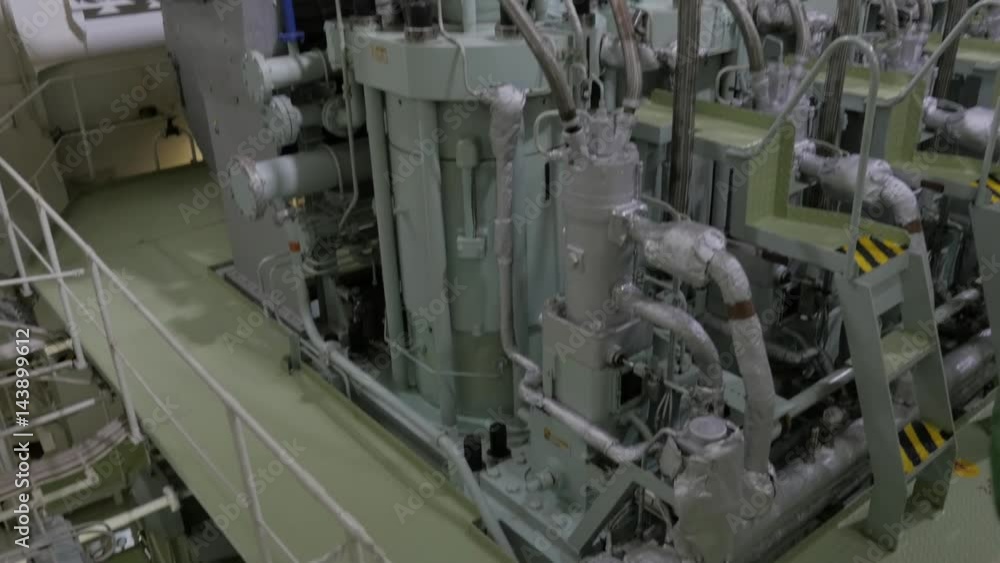 Main engine in engine room of ship Main engine in engine room of ship