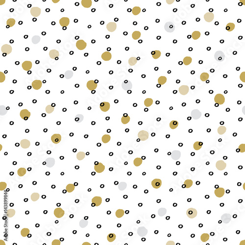 Simple fabric design with black and white polka dots.