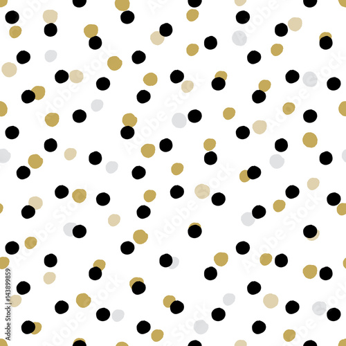 Simple fabric design with black and white polka dots.