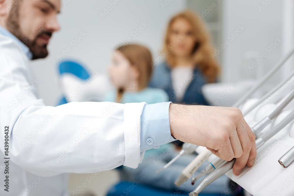 Experienced dentist needing some tools for checkup Experienced dentist needing some tools for checkup