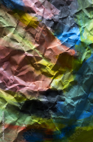 Background of colored crumpled paper shot close-up 