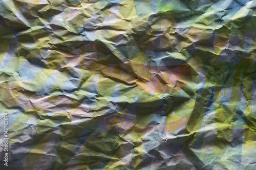 Background of colored crumpled paper shot close-up  © lester120