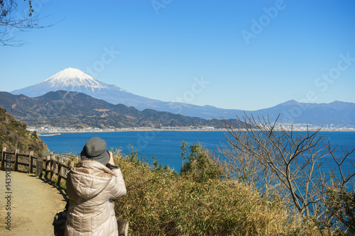 Woman looking at Mt. Fuji from the Satta Pass photo