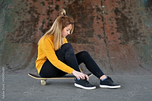 beautiful girl with skateboard 