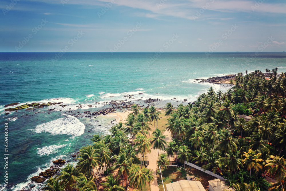 View  to ocean and palms from the lighthouse on the most south point of Sri lanka,