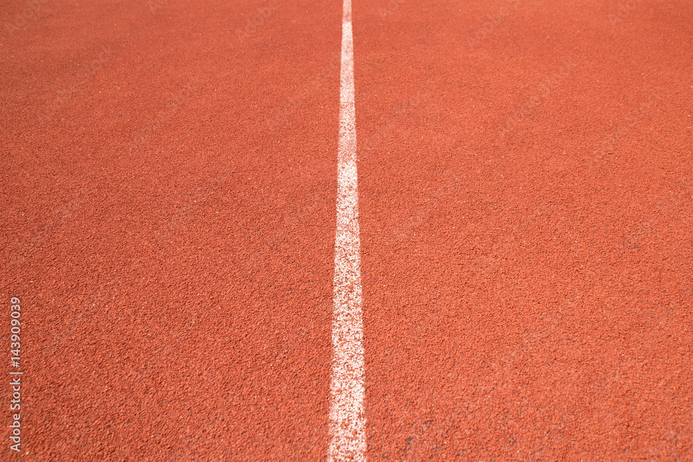 Close up perspective white line of Athletics track in sport stadium Close up perspective white line of Athletics track in sport stadium