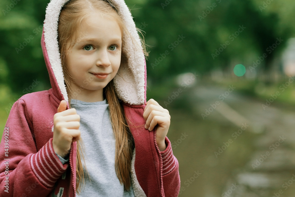 Autumn portrait of a girl 6 years old, in a jacket Autumn portrait of a girl 6 years old, in a jacket