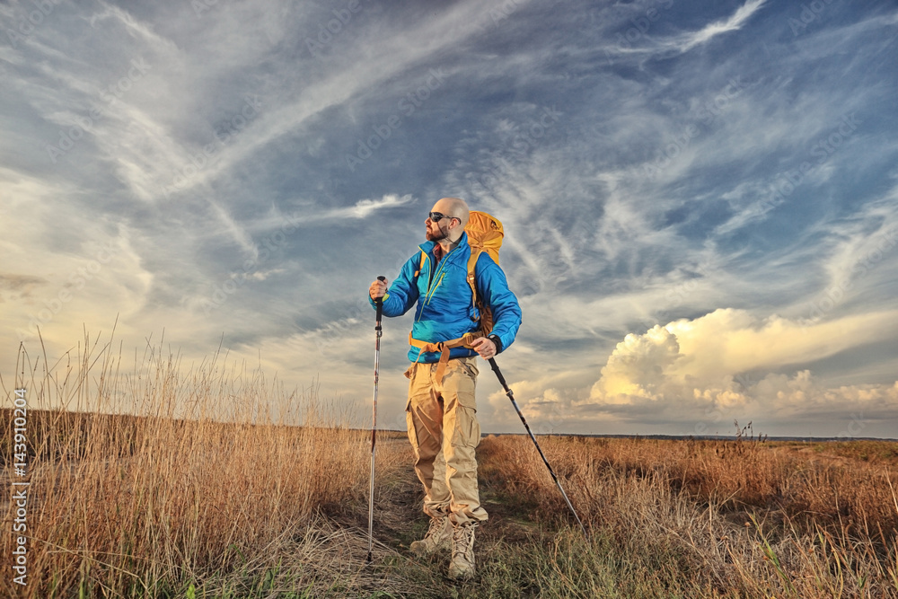 man traveler with a backpack wildlife adventure man traveler with a backpack wildlife adventure