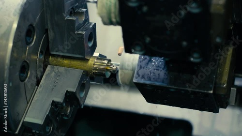 CNC milling machine makes some steel part