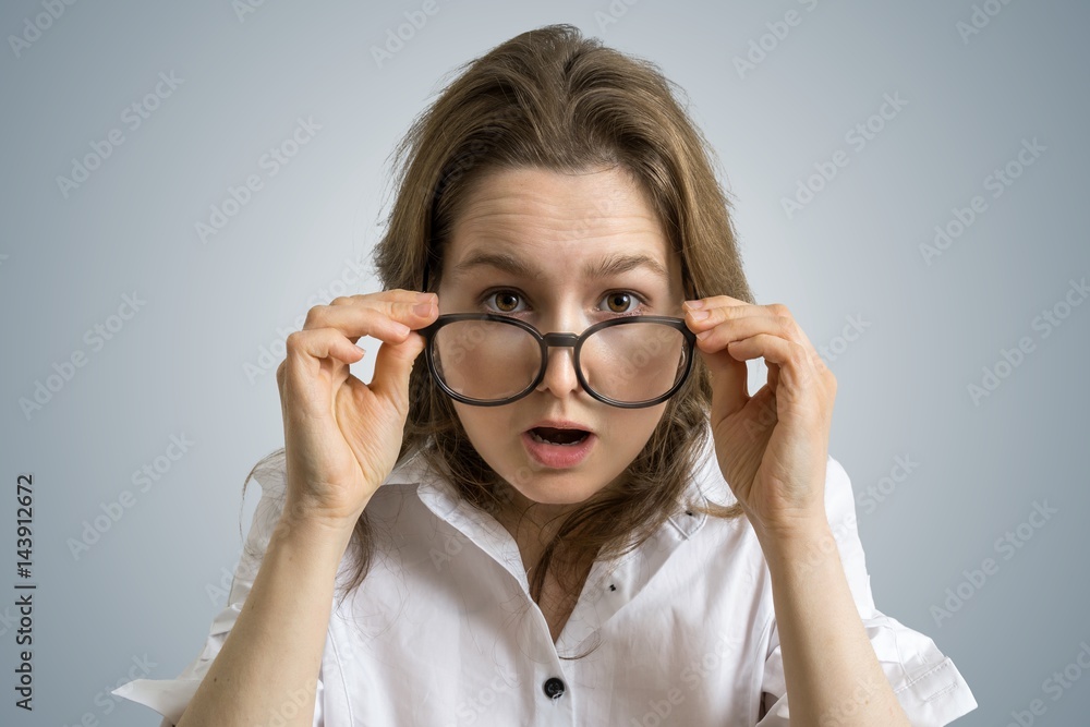 Young funny woman is shocked and surprised. Young funny woman is shocked and surprised.