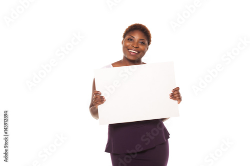 Happy African American business woman showing empty copey space photo