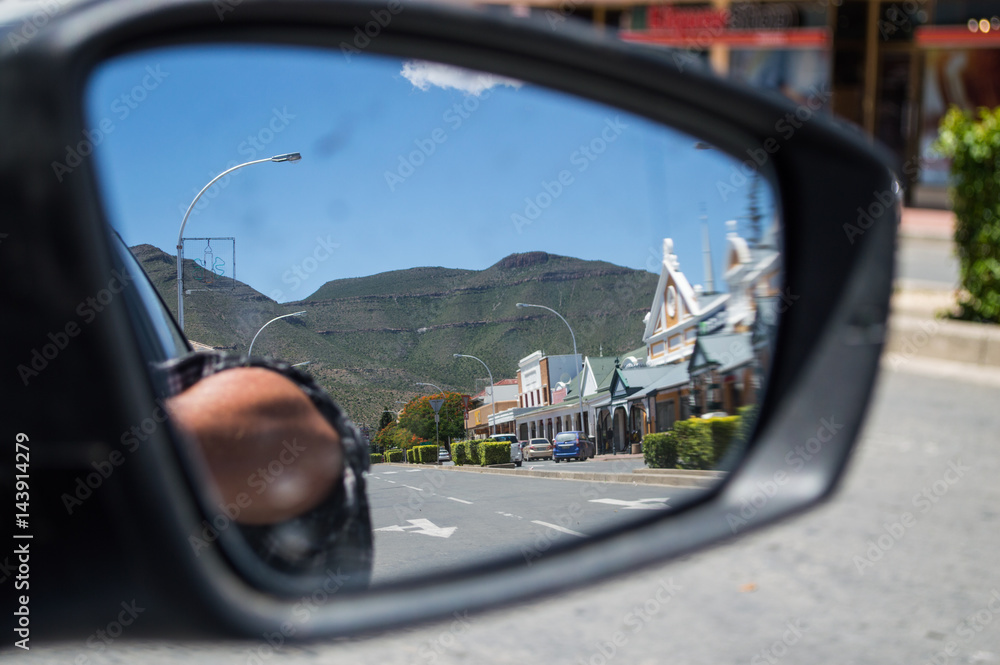 Graaff-Reinet Main Street Seen Through Rearview Mirror, Free State, South Africa Graaff-Reinet Main Street Seen Through Rearview Mirror, Free State, South Africa