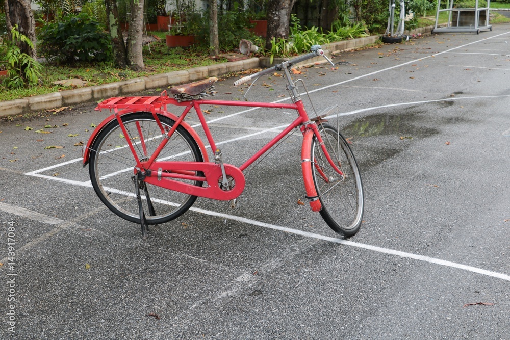 Fototapeta premium bicycle red classic vintage in former beautiful with copy space for add text