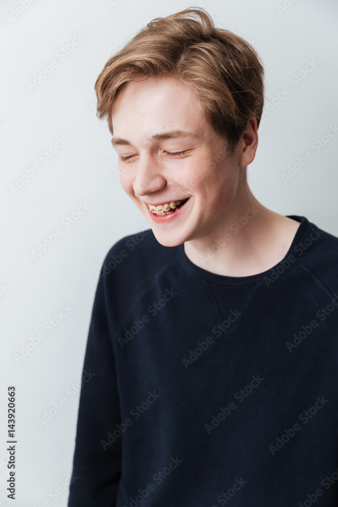Vertical image of laughing man in sweater Vertical image of laughing man in sweater