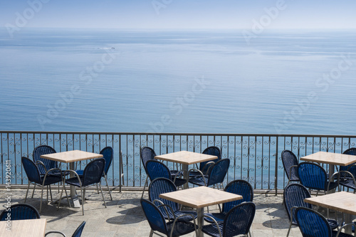 Sea view terrace with tables