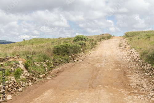 Farm road  field and hill