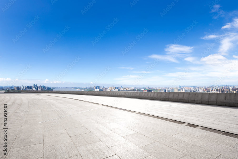 empty floor with modern cityscape and skyline