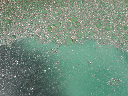 Canvas Print Murky, polluted water, with some froth. Environmental issues.